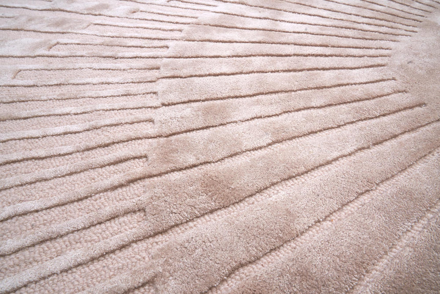 Radius Beige kerek gyapjú szőnyeg szálszerkezete közelről