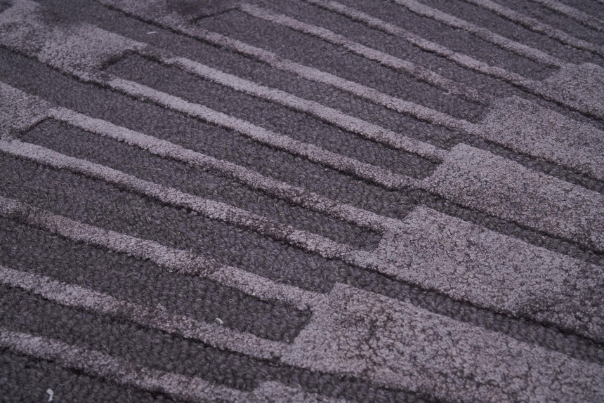 Radius Dark Gray kerek gyapjú szőnyeg nappaliban