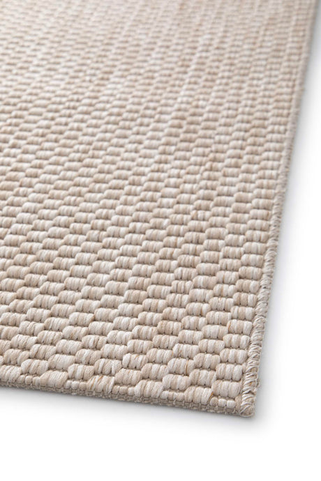 Grano Beige kültéri szőnyeg sarka és szegélye közelről