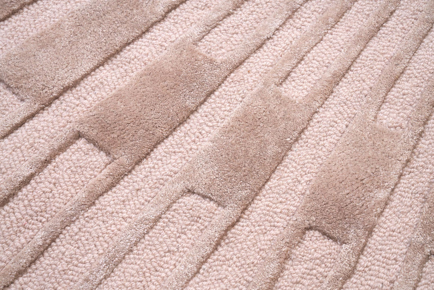 Radius Beige kerek gyapjú szőnyeg nappaliban