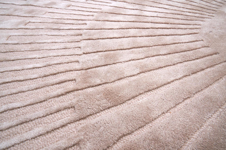 Radius Beige kerek gyapjú szőnyeg szálszerkezete közelről